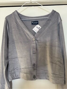 New with tags large jockey crop
4  button long sleeve
 soft velour crop top